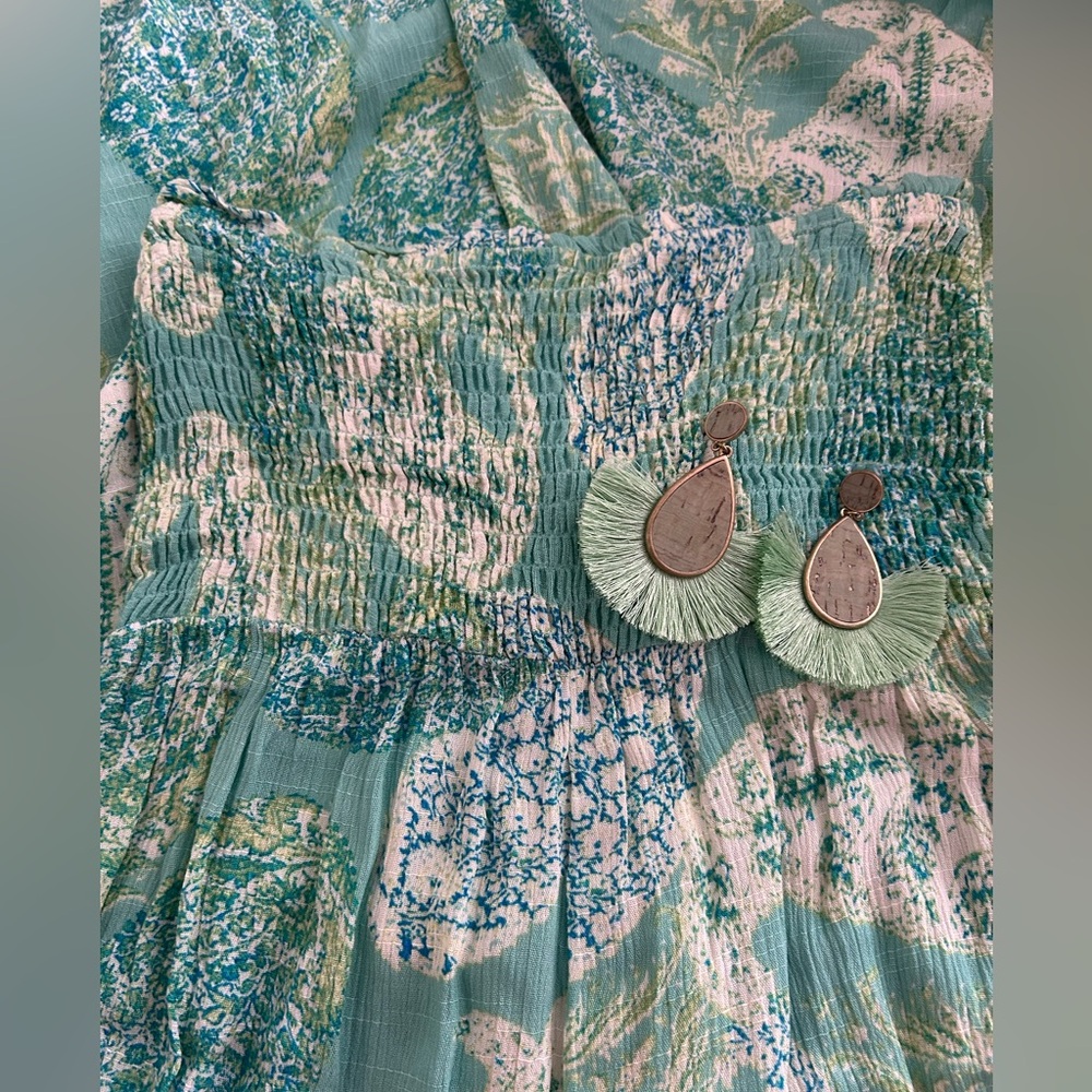 ** Bundle ** 
Woman’s strapless pant suit & earrings!